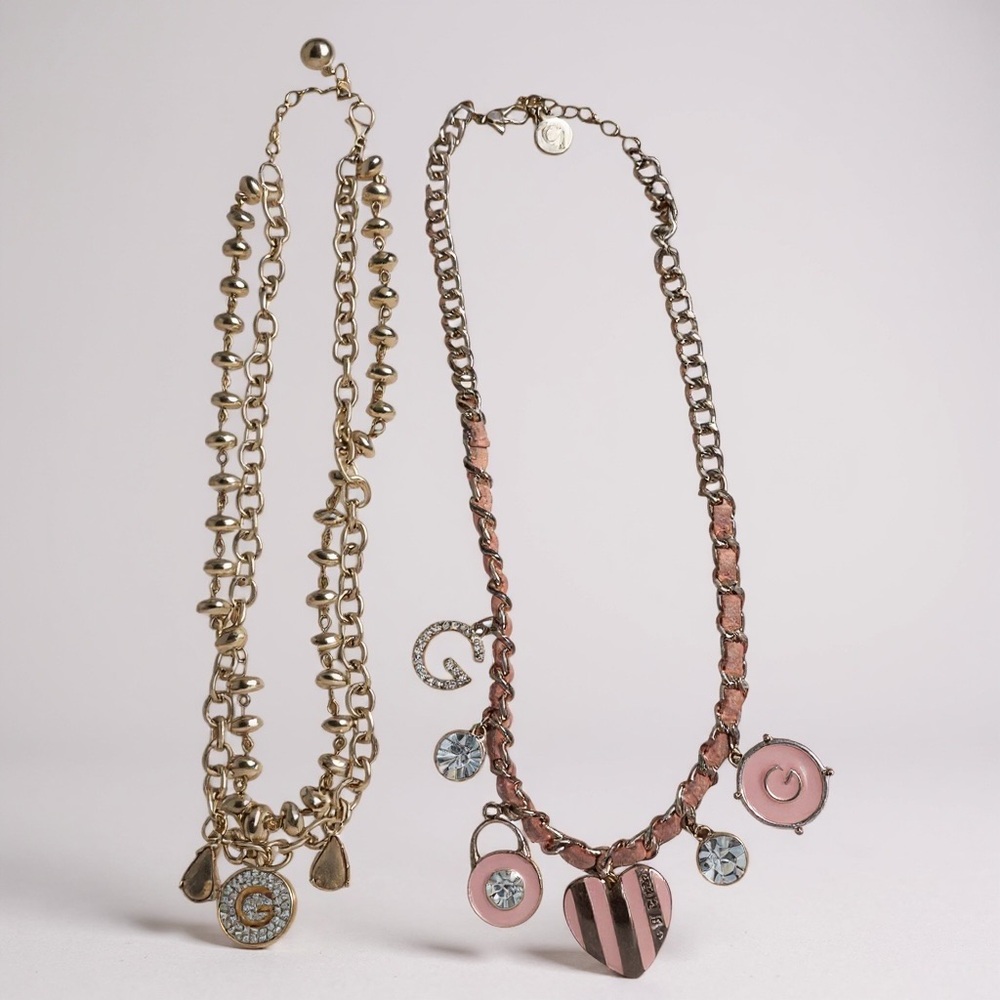 Guess Golden and Pink Charm Necklace Duo used